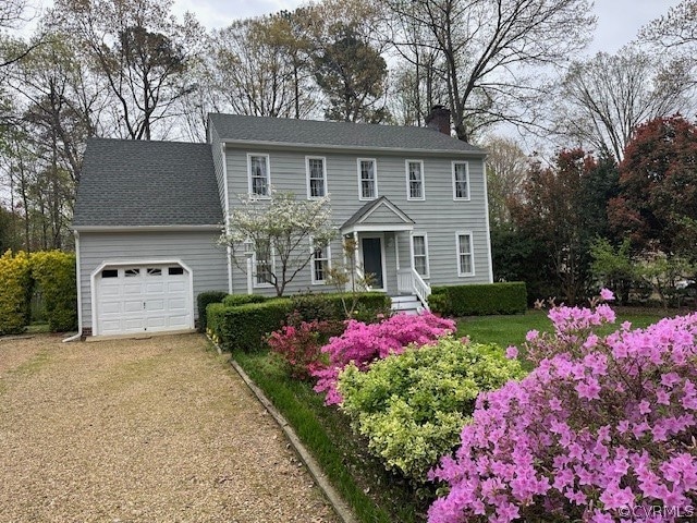 Colonial home with a garage
