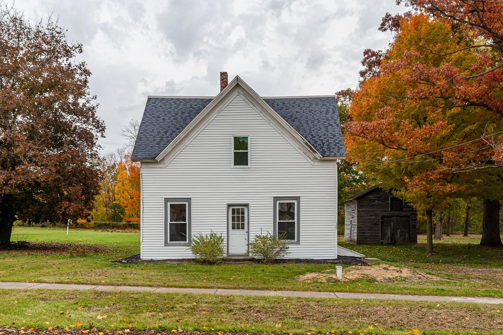 300 W Pleasant St, Hubbardston, MI 48845 - photo 1