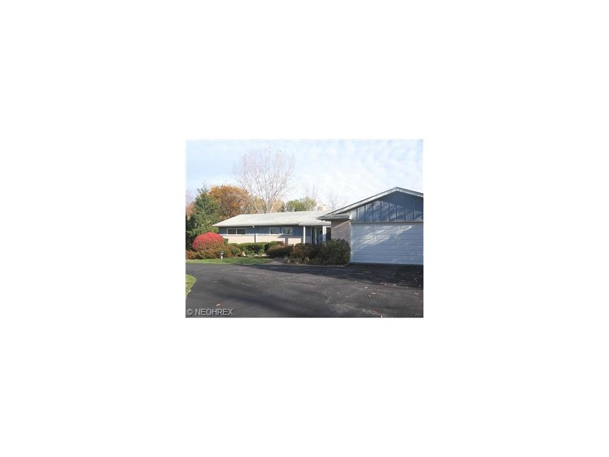 Classic ranch of brick and cedar at end of cul-de-