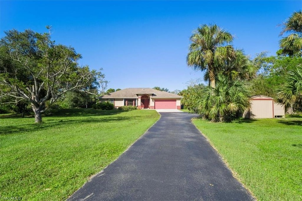 1121 23rd St SW, Naples, FL 34117 - photo 1