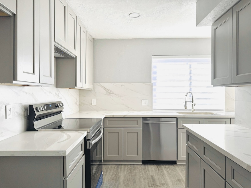 Step into this beautiful, modern kitchen featuring