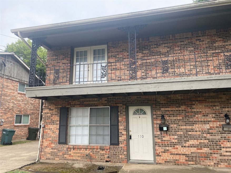 View of front of property featuring brick siding