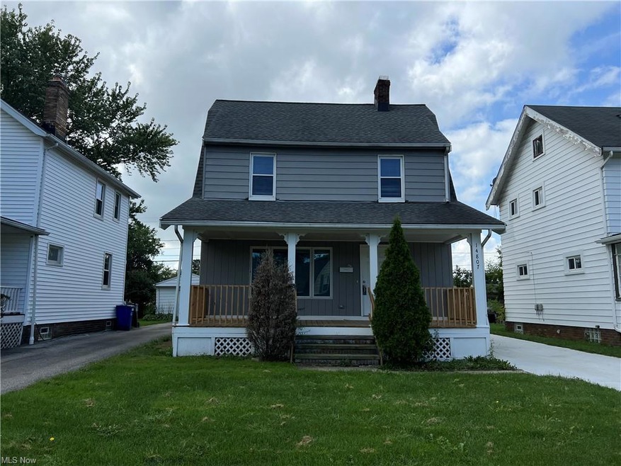 View of front of home featuring a porch and a front lawn