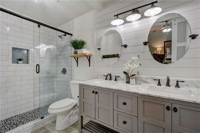 Your stunning master bath boasts double vanities w