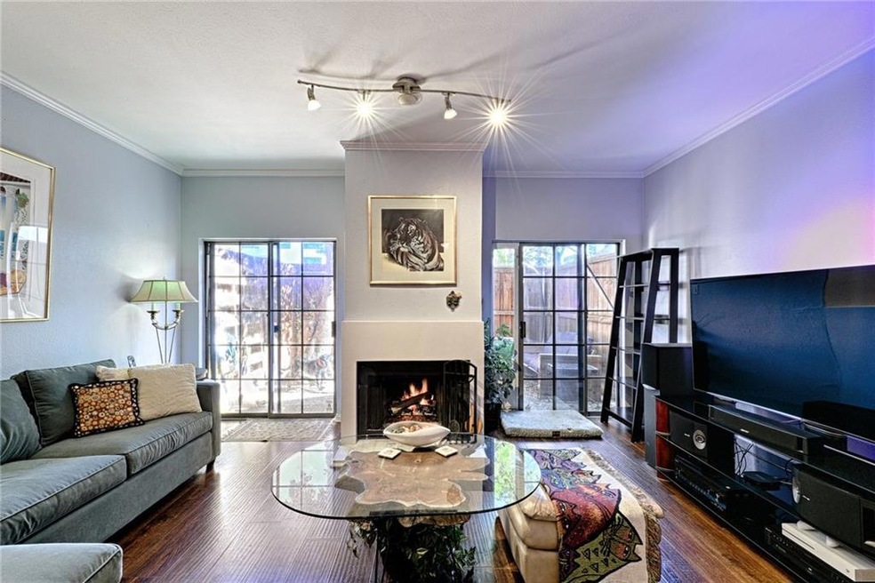 Living room with two sliding doors that open to th