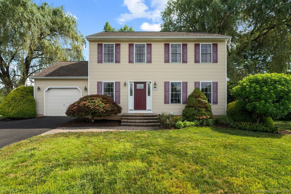 This pretty colonial sits on a quiet cul de sac