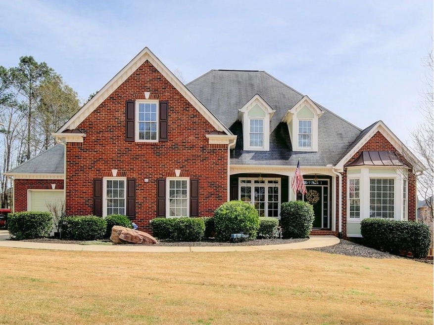 Brick front. Traditional home quietly nestled on a