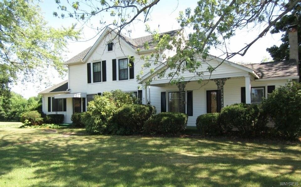 Welcome to THE FARM at 8870 Ridge Road! This home 
