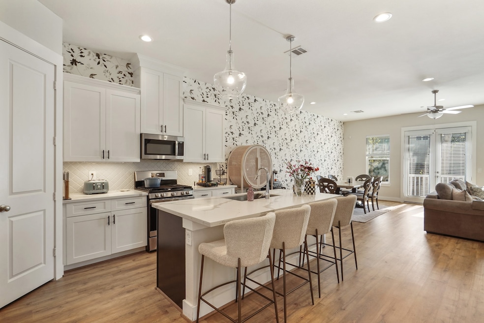 Light and bright kitchen with quartz countertops a