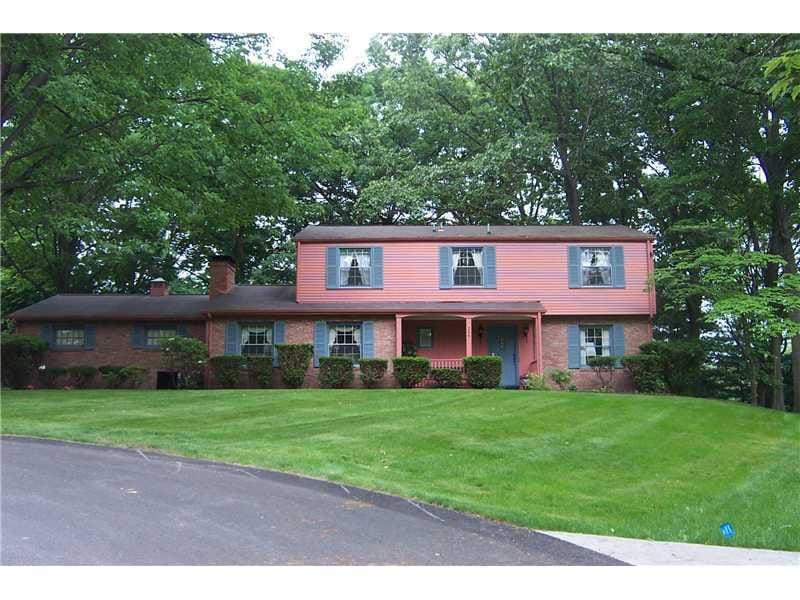 Exterior Front. Nice landscaping on this mature lo