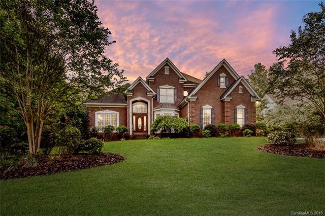 Stunning custom home is pristine condition with lo