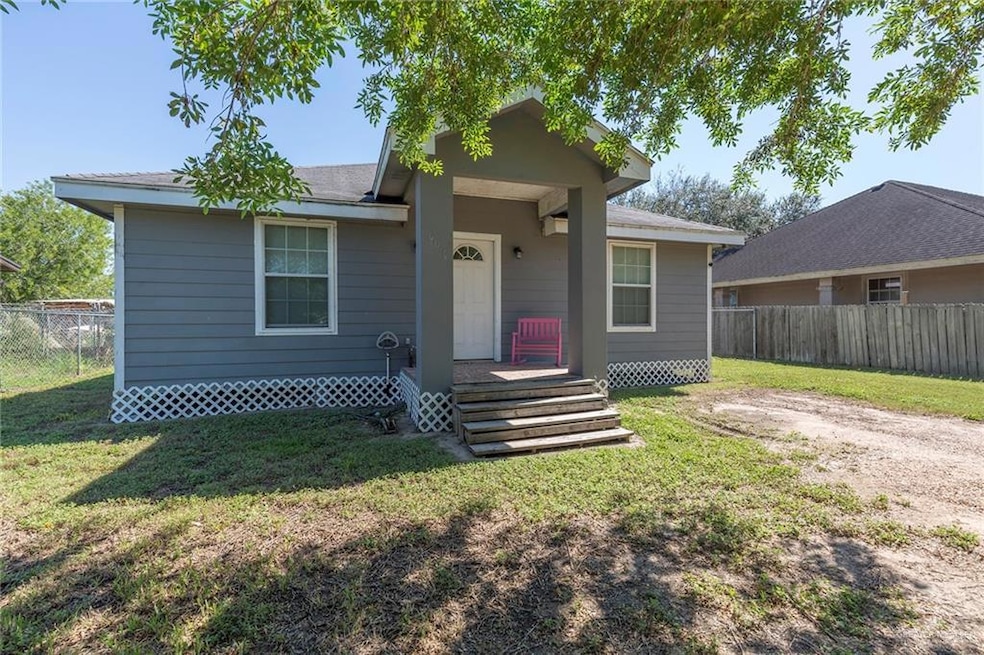 View of front of property with a front yard