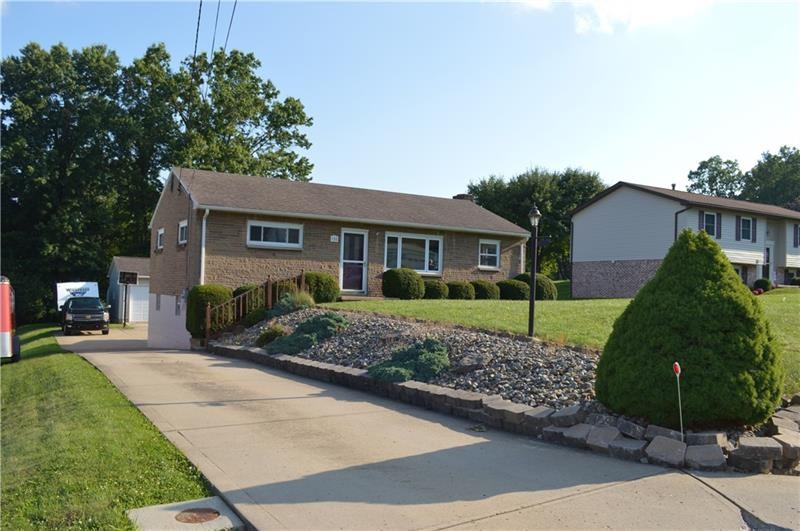 Welcome to this move in ready brick ranch in Butle