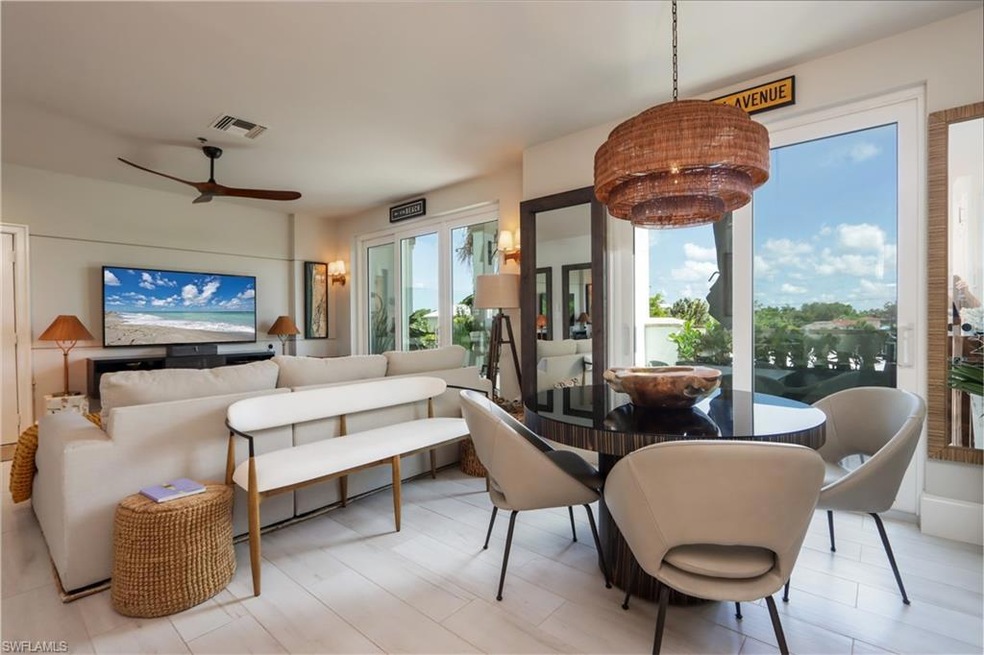 Living room featuring ceiling fan