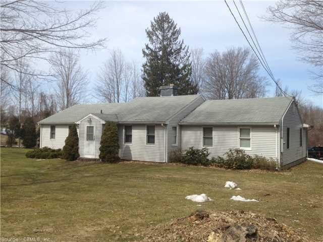 Exterior Front. Large lot on quiet Round Hill Road