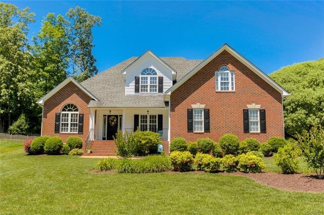 Home has Brick Front, Brick Porch, Gorgeous Window