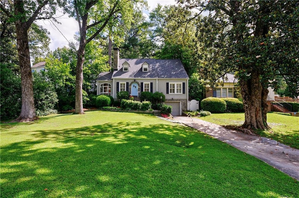 Charming Cape Cod in sought after Garden Hills a pool and park neighborhood