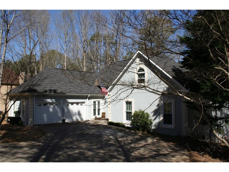 Well maintained ranch home on a wooded lake lot wi