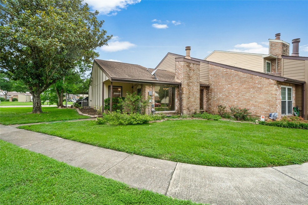 Meticulously landscaped corner unit