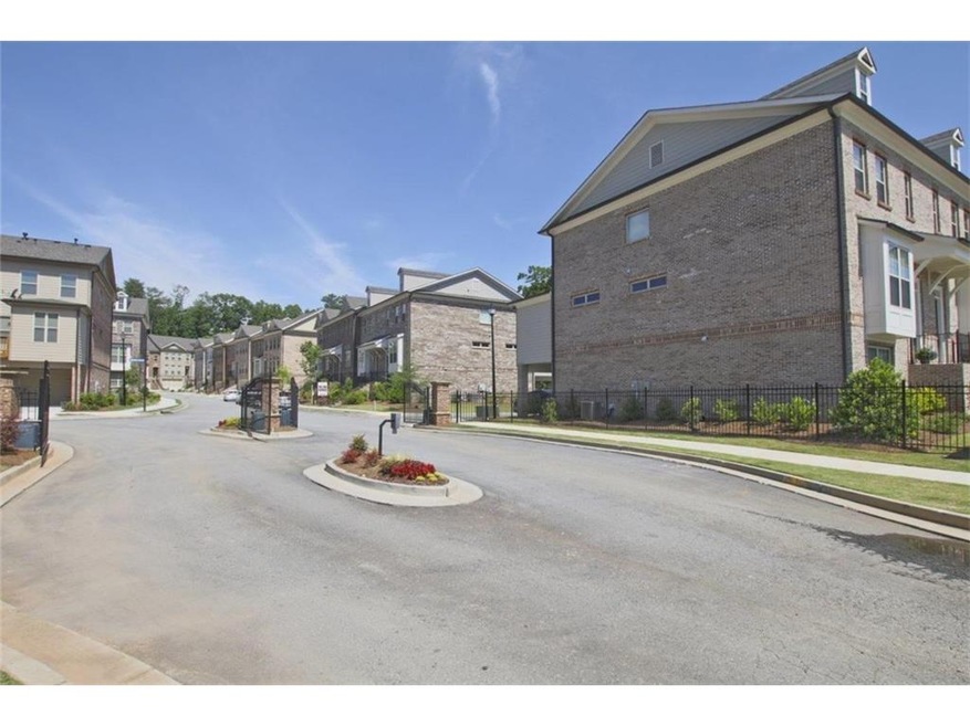 Welcome home to The Towns at East Village, a gated