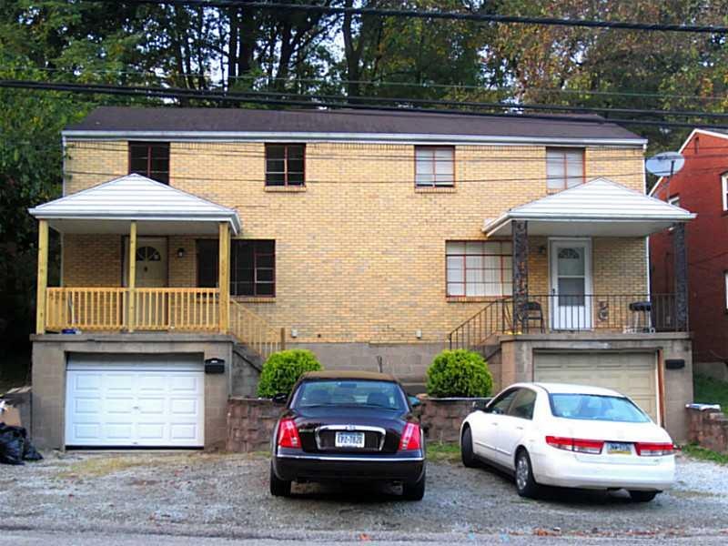 Exterior Front. Come see this Brick Duplex in a Gr