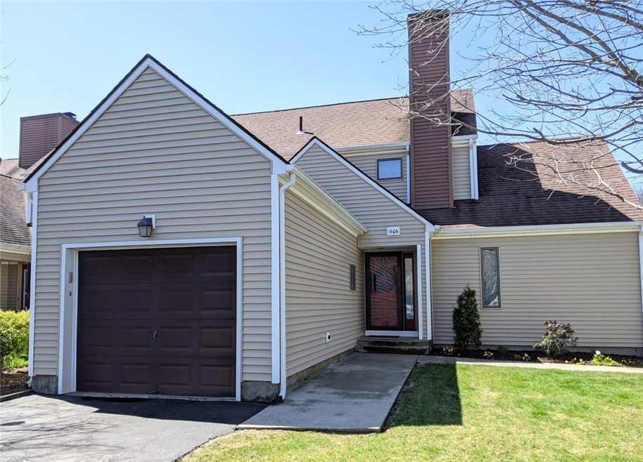 Private end unit with garage.  Building is vinyl s