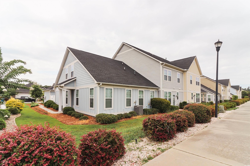 View of home's exterior featuring central AC and a