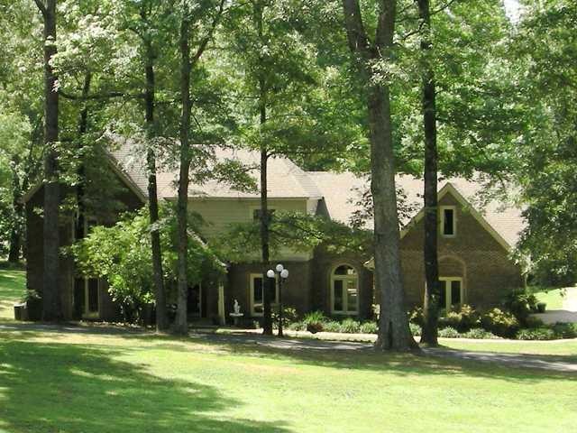 Well maintained 5 bedroom home nestled among matur