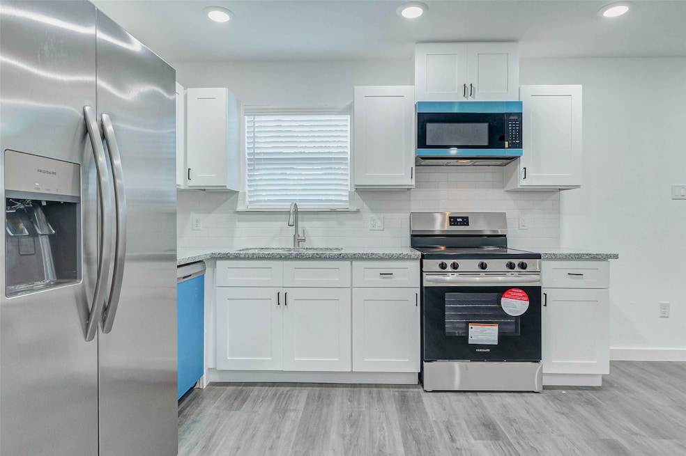 8218 Bigwood St unit A, Houston, TX 77078 - photo 1