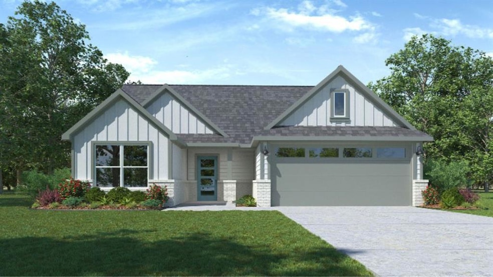 View of front of property featuring board and batten siding, a front lawn, roof with shingles, and concrete driveway