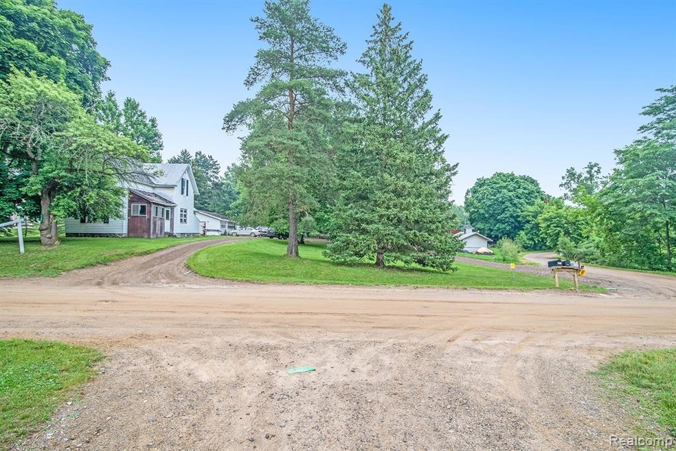 Large deep lot with circle drive. 458 feet of fron