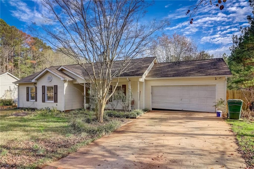 Ranch-style house with a garage