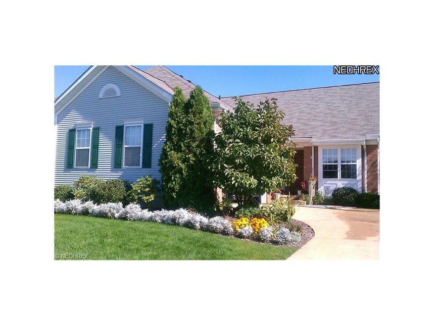 AURORA CONDO. METICULOUSLY MAINTAINED. 2 CAR SIDE 