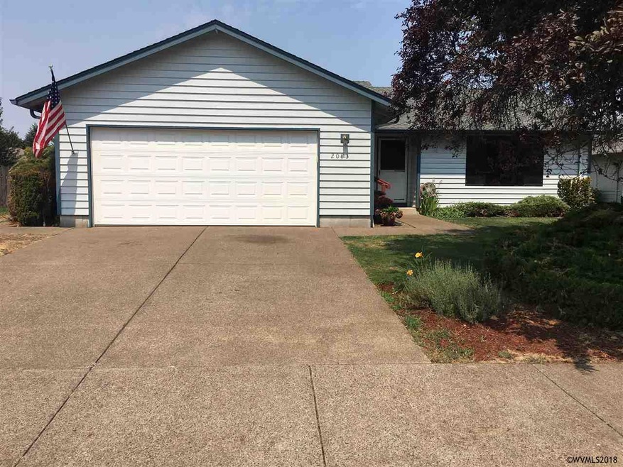 Two car garage, driveway parking.