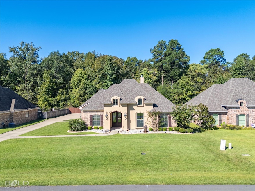 French country inspired facade featuring a front l