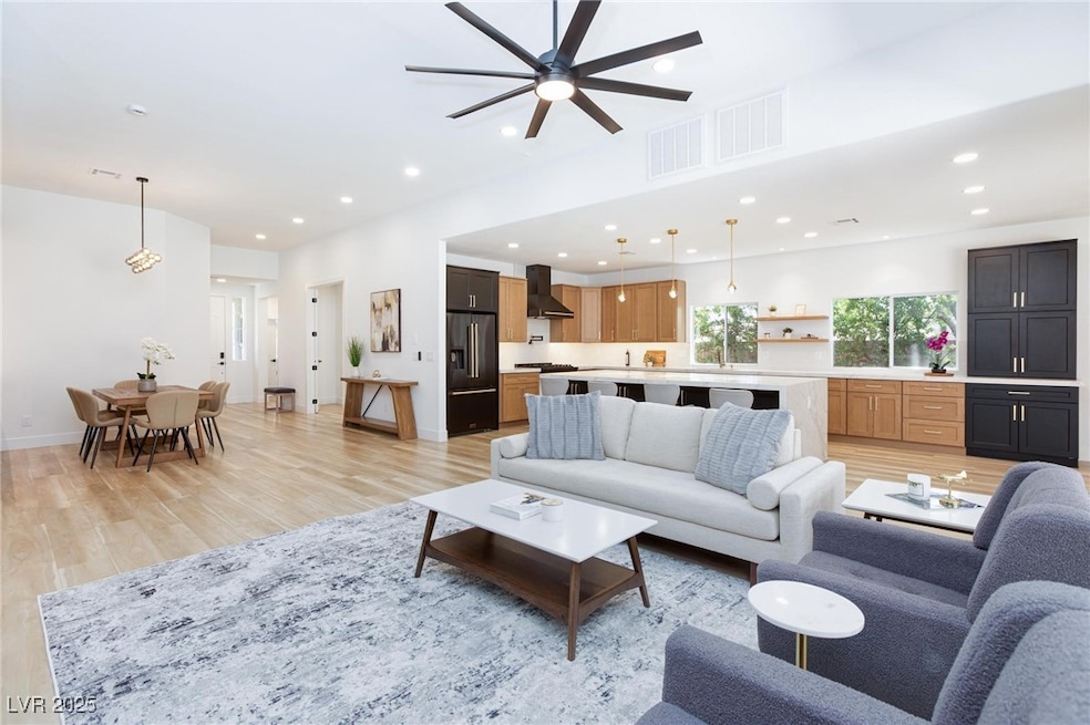 Living area featuring light wood finished floors,