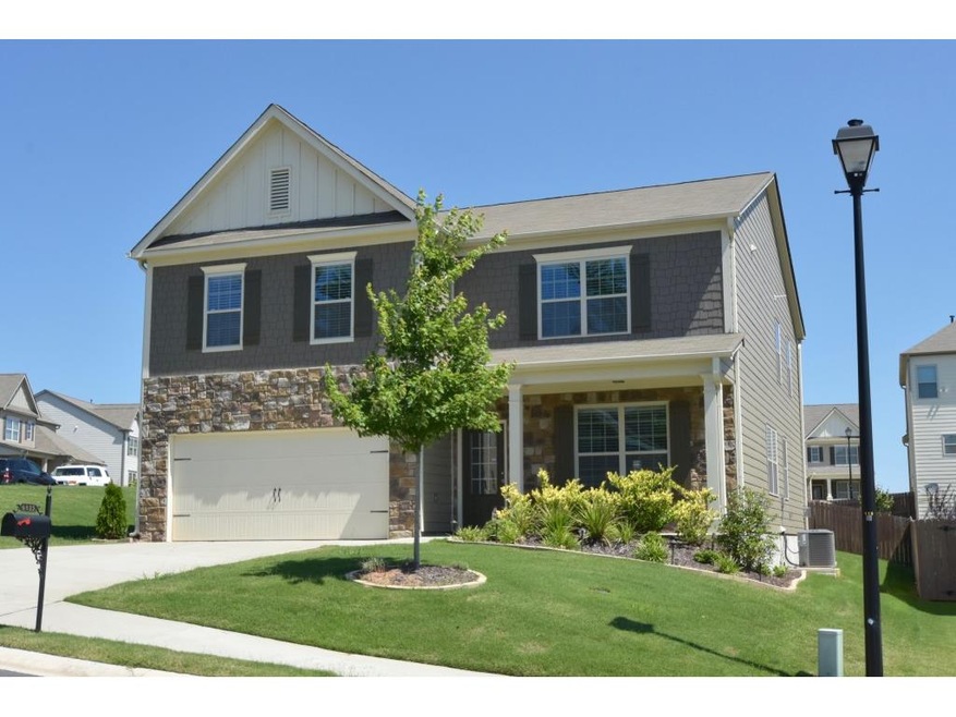 Stone & Hardiplank Craftsman home built by DR Hort