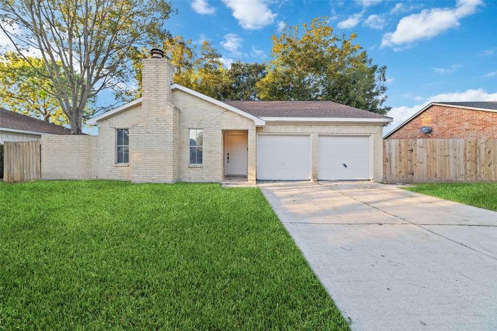7006 Winding Trace Dr, Houston, TX 77086 - photo 1
