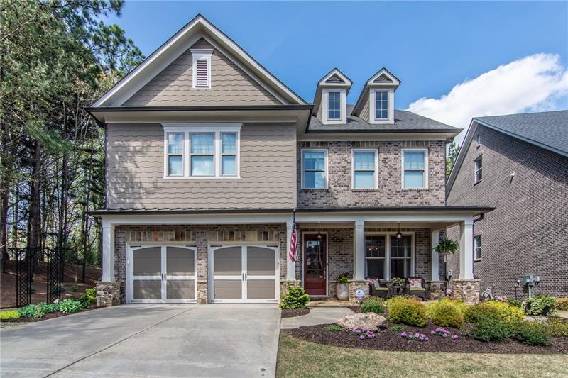 Stunning 4 side brick home on a wooded, corner Cul