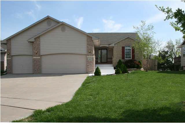 Beautiful Andover home with brick and stone, situa