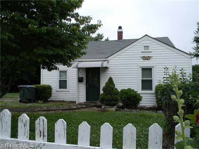 Exterior Front. The perfect cottage home with charm.