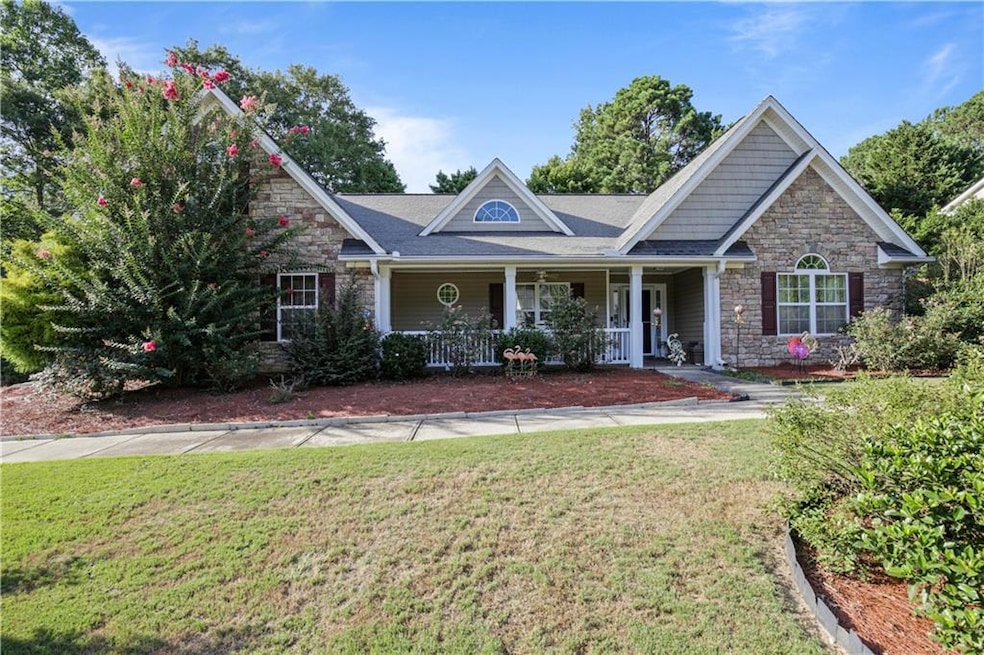 View of front of home featuring covered porch and 