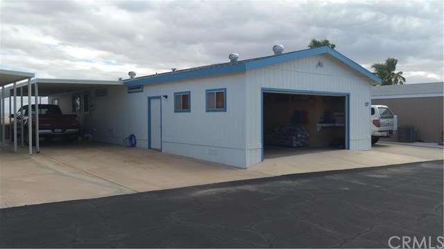 2 carports both sides and a 2 car garage