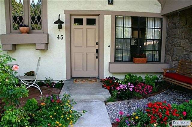 Front entrance with table & chairs to the left and
