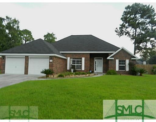 Exterior Front. Immaculate brick/vinyl home on pri
