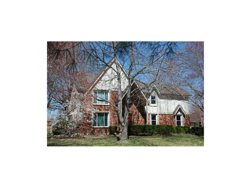 Front of home  - trees are ready to pop leaves!  B