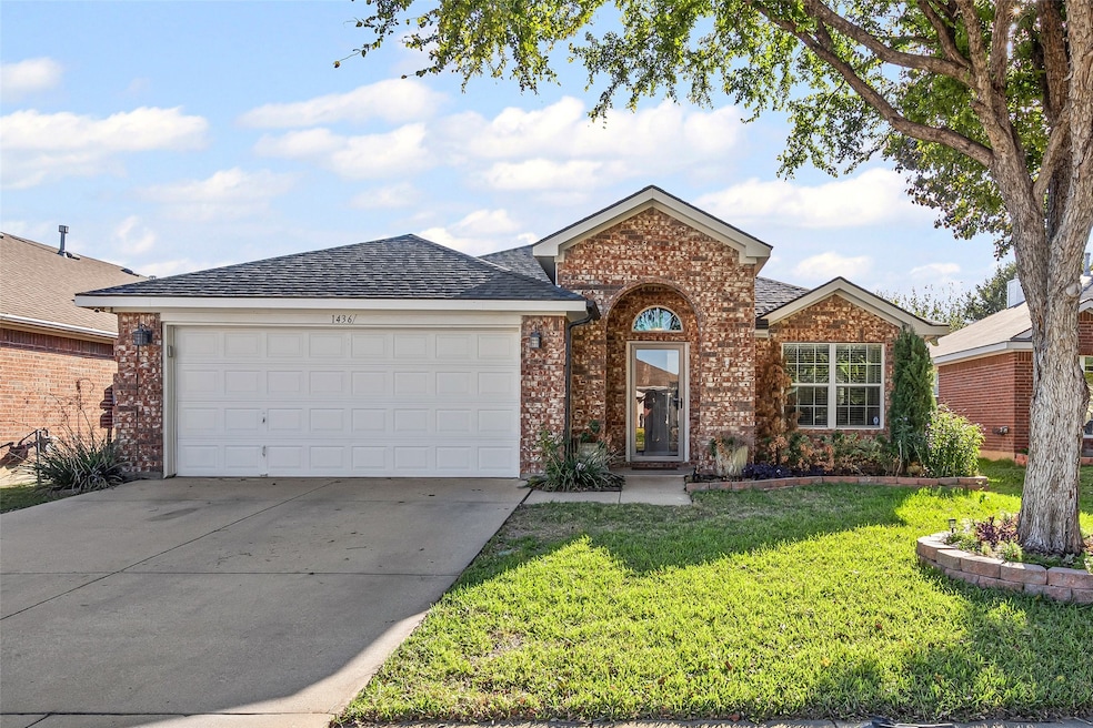 Ranch-style home featuring brick siding, driveway, a front lawn, roof with shingles, and a garage
