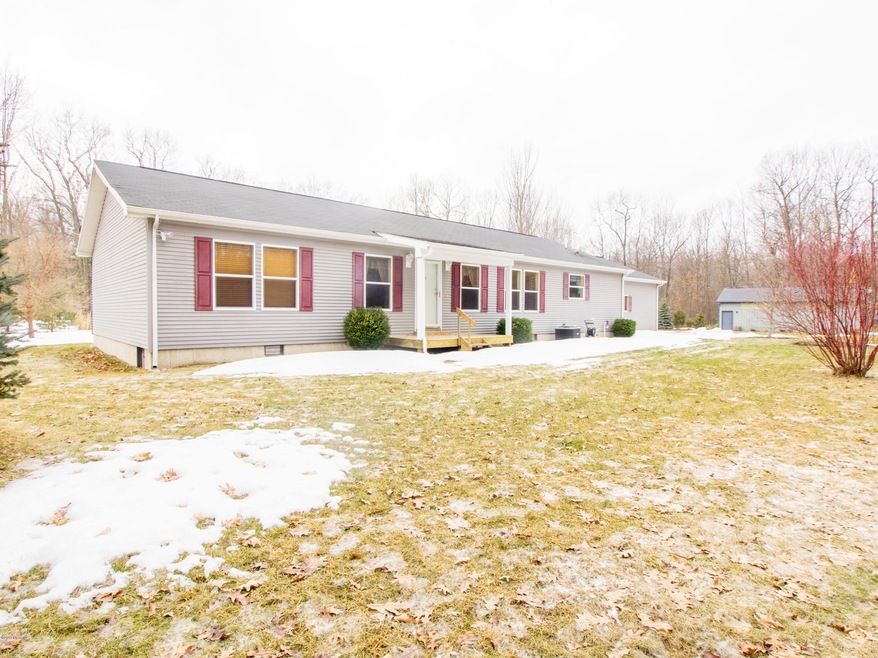 1050 W Woodland Park Dr, Bitely, MI 49309 - photo 1