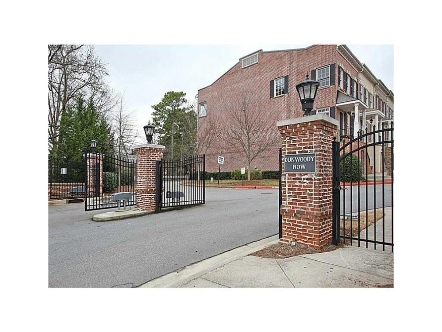 Facade/Exterior Front. Gated Entrance