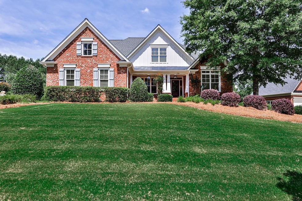 View of front of property with a front yard